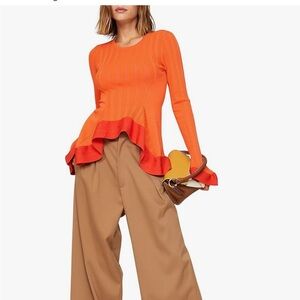 Chic Orange Peplum top. Size S.